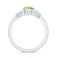 Oval peridot engagement ring with diamond wedding band, featuring a 1-carat peridot gemstone and sparkling diamond accents.