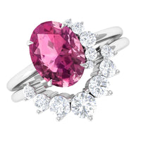 Oval pink tourmaline and diamond wedding ring set by Rosec Jewels, featuring a 1 carat pink gemstone with sparkling diamonds.