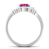 Oval pink tourmaline and diamond wedding ring set by Rosec Jewels, featuring a 1-carat gemstone with sparkling accents.