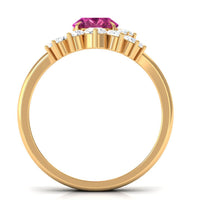 Oval pink tourmaline and diamond wedding ring set by Rosec Jewels, featuring a sparkling pink gemstone and elegant band design.