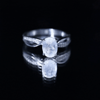 Oval Moonstone Infinity Engagement Ring with Diamond