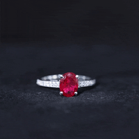 1.5 Carat Lab Grown Ruby Oval Engagement Ring with Diamond Side Stones