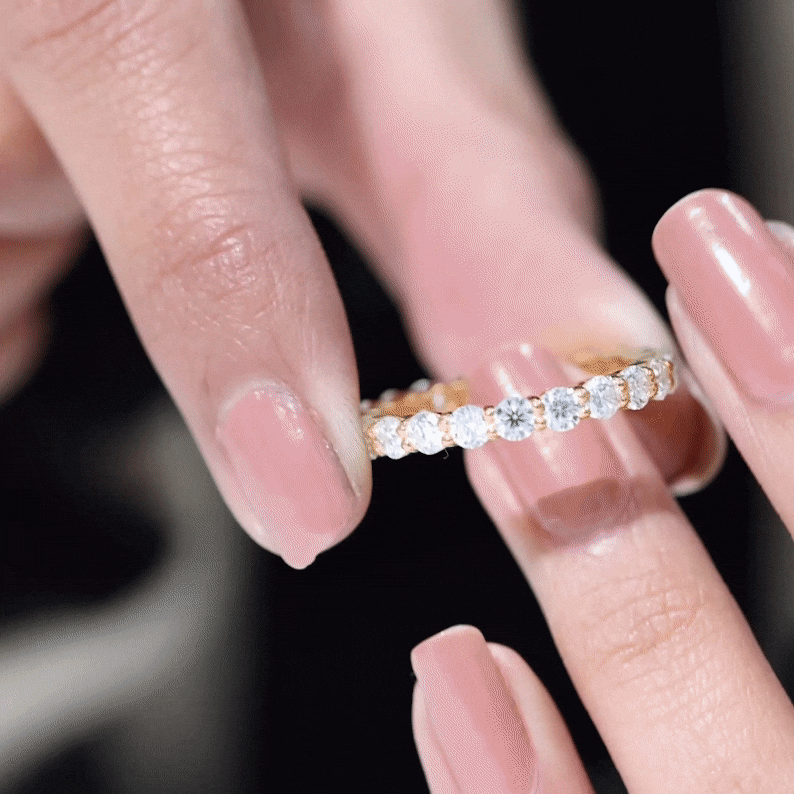 Yellow gold certified round moissanite eternity wedding band ring by Rosec Jewels, featuring sparkling circular moissanite gemstones.
