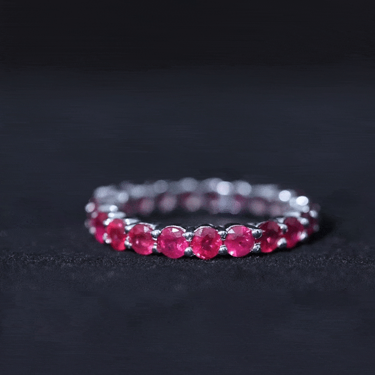 Genuine red ruby full eternity ring from Rosec Jewels featuring a continuous band of sparkling red rubies.