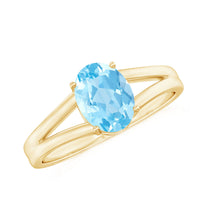 Genuine oval aquamarine solitaire engagement ring with split shank design from Rosec Jewels, showcasing the elegant gemstone setting.