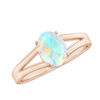 Oval Ethiopian Rainbow Opal engagement ring with split shank in 1.2 carats, featuring vibrant multicolor flashes and rose gold band.