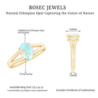 Oval Ethiopian rainbow opal engagement ring with split shank setting by Rosec Jewels, showcasing vibrant colors and elegant design.
