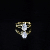 Oval 1 Carat Moissanite engagement ring by Rosec Jewels with certificate, featuring a sparkling white gemstone and elegant band.