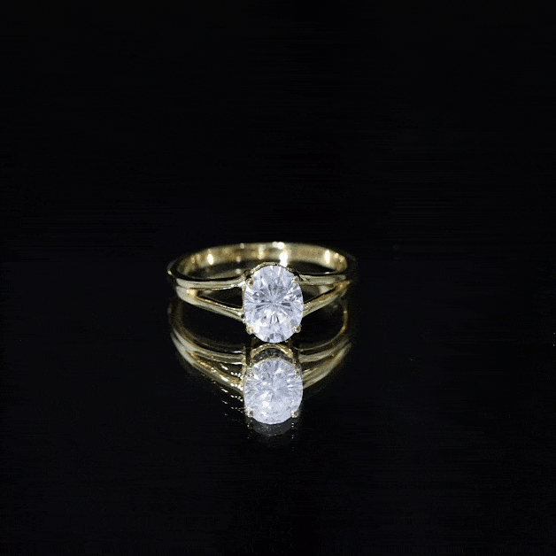 Yellow gold oval moissanite engagement ring from Rosec Jewels with certificate, featuring a 1 carat center stone and elegant design.