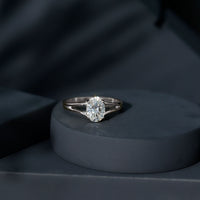 Oval 1 Carat Moissanite engagement ring by Rosec Jewels featuring a sparkling gemstone and elegant band with certificate.