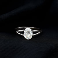 Elegant 1 Carat Oval Moissanite engagement ring from Rosec Jewels featuring a sparkling gemstone and a sleek band.