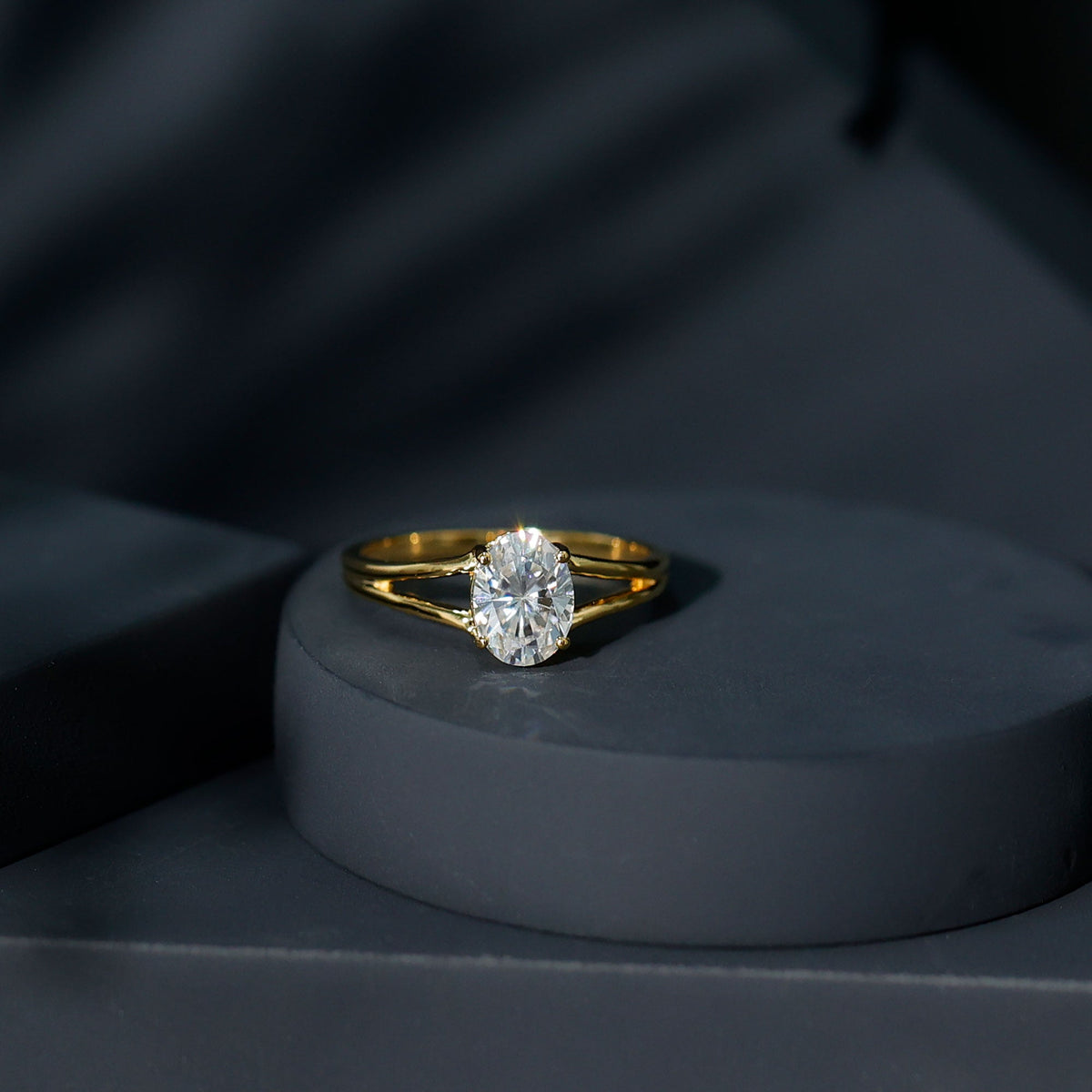 Oval 1-carat Moissanite engagement ring by Rosec Jewels featuring a sparkling stone and elegant band with certification.