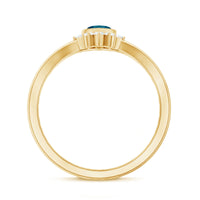 0.7 Carat Marquise Cut London Blue Topaz Cocktail Ring with Diamond