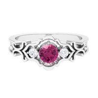 Rosec Jewels pink tourmaline and diamond cut out antique ring featuring a 0.50 CT pink tourmaline gemstone and intricate metalwork.