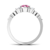 Pink tourmaline and diamond cut out antique ring by Rosec Jewels featuring a 0.50 CT pink tourmaline gemstone in an ornate design.