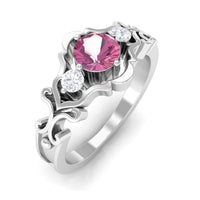 Pink tourmaline and diamond cut-out antique ring with intricate detailing, showcasing Rosec Jewels craftsmanship.