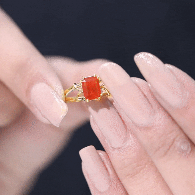 Yellow 1 Carat solitaire emerald cut fire opal engagement ring by Rosec Jewels featuring a striking gemstone and sleek band.