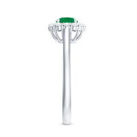 Round emerald and diamond engagement ring by Rosec Jewels featuring a classic design and elegant band.