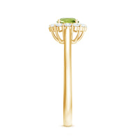 Natural half-carat peridot engagement ring with diamond halo, featuring a rose gold band from Rosec Jewels.