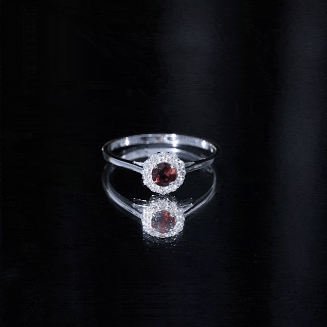 Yellow gold engagement ring with a 2.3-carat real garnet center stone surrounded by a diamond halo, from Rosec Jewels.