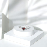 Certified 2.3 carat real garnet engagement ring with diamond halo by Rosec Jewels, featuring a silver band and intricate design.