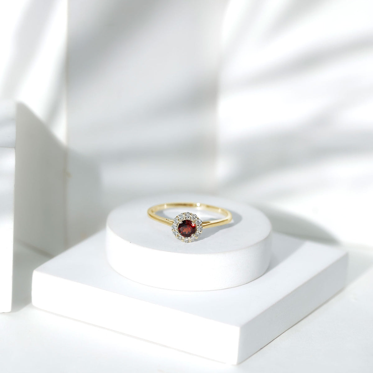Certified 2.3 carat real garnet engagement ring with diamond halo from Rosec Jewels, showcasing the detailed design and sparkling stones.