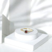 Certified 2.3 carat real garnet engagement ring with diamond halo from Rosec Jewels, showcasing the detailed design and sparkling stones.