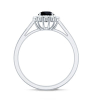 Minimalist black spinel engagement ring with diamond halo by Rosec Jewels, featuring a sleek black spinel center stone and sparkling halo.