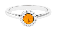Fire opal and diamond floating halo engagement ring from Rosec Jewels featuring a central fire opal surrounded by sparkling diamonds.
