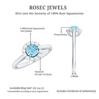 Elegant 1-carat aquamarine and diamond floating halo engagement ring by Rosec Jewels, featuring a stunning gemstone and intricate design.