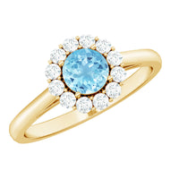 Aquamarine and diamond floating halo engagement ring by Rosec Jewels, showcasing a center aquamarine gemstone with surrounding diamonds.