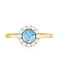 Aquamarine and diamond floating halo engagement ring by Rosec Jewels featuring a central aquamarine gemstone surrounded by a diamond halo.