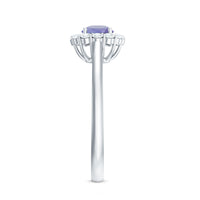 Genuine Tanzanite engagement ring with diamond halo, featuring a classic design and rose gold band from Rosec Jewels.