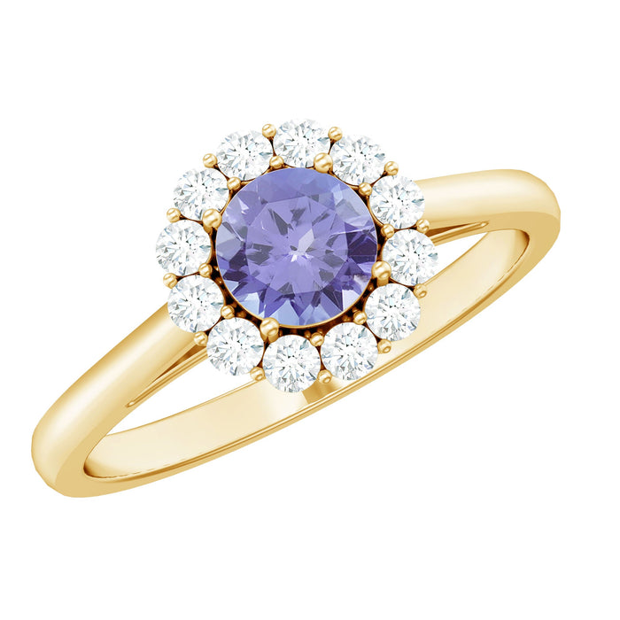 Genuine Tanzanite engagement ring with diamond halo, featuring a classic design and intricate detailing from Rosec Jewels.