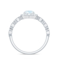 Vintage Style Moonstone Engagement Ring with Diamond Accent