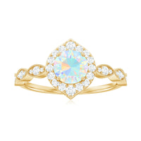 Vintage Ethiopian Opal engagement ring with real diamond halo, featuring intricate design and rose gold band from Rosec Jewels.