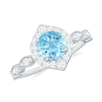 Elegant 0.8 carat aquamarine and diamond designer engagement ring by Rosec Jewels, showcasing the intricate setting and sparkling gemstones.