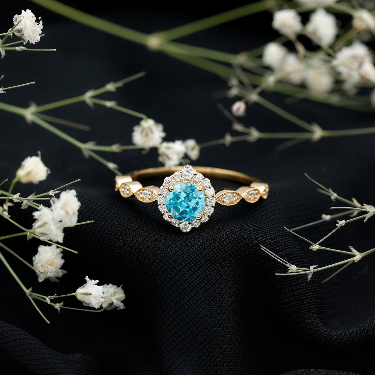 0.8 carat aquamarine and diamond designer engagement ring from Rosec Jewels featuring a sparkling gemstone and intricate band design.
