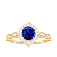 Vintage Inspired 1 Carat Lab Grown Blue Sapphire Engagement Ring with Diamond Halo