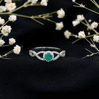 Real Emerald and Diamond Criss Cross Engagement Ring