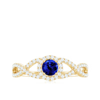 Certified 0.6 Carat Lab Grown Blue Sapphire Crossover Engagement Ring with Diamond