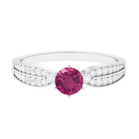 Pink Tourmaline engagement ring with six prongs and diamond side stones, featuring a polished gold band from Rosec Jewels.