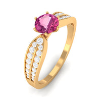 Pink tourmaline engagement ring with six prongs and diamond side stones, crafted by Rosec Jewels.
