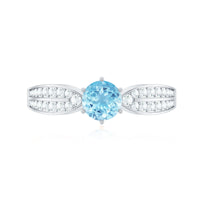 Elegant engagement ring featuring a real aquamarine center stone with diamond side stones, crafted by Rosec Jewels.
