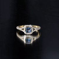 Rosec Jewels 1 Carat Princess Cut London Blue Topaz engagement ring with diamond split shank design, showcasing vibrant blue gemstone.