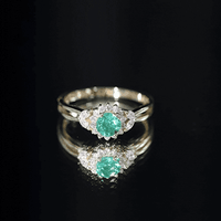 Real Emerald and Diamond Flower Engagement Ring with Split Shank
