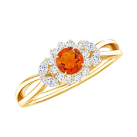 Fire opal and diamond flower engagement ring with split shank from Rosec Jewels, showcasing intricate floral design and sparkling gemstones.