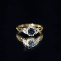 0.6 Carat London Blue Topaz Floral Engagement Ring with Diamond