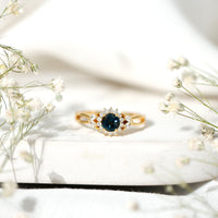 0.6 Carat London Blue Topaz Floral Engagement Ring with Diamond