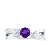 Real amethyst engagement ring with diamond infinity shank by Rosec Jewels, featuring a large purple amethyst gemstone and sparkling diamonds.